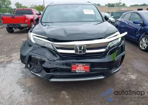 2019 Honda Pilot Touring z USA, uszkodzony, nr VIN 5FNYF6H93KB013191